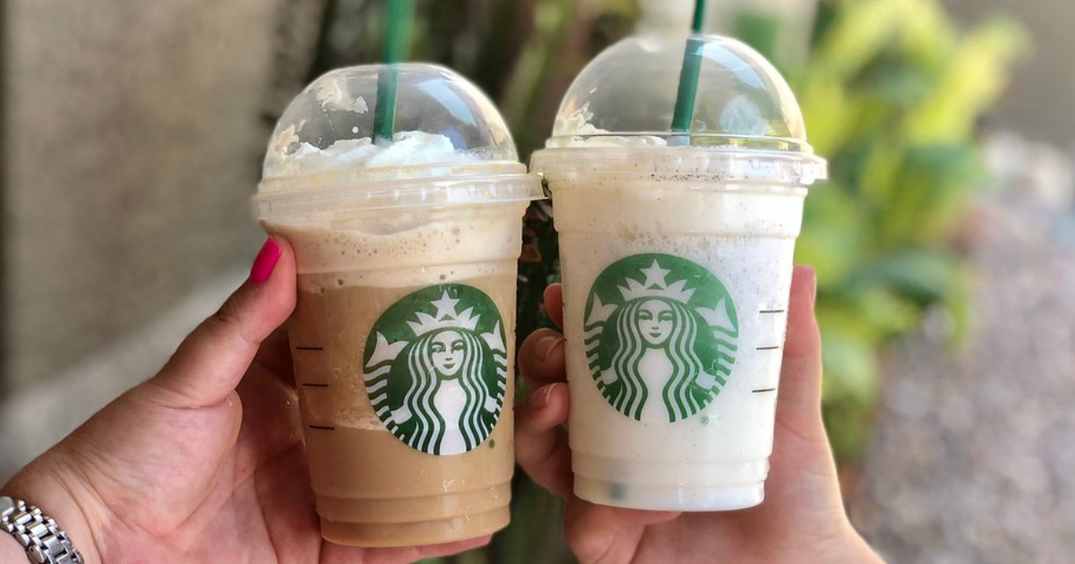 two Starbuks Frappuccinos being held outside