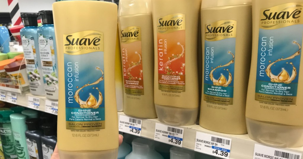 hand holding bottle of suave at CVS
