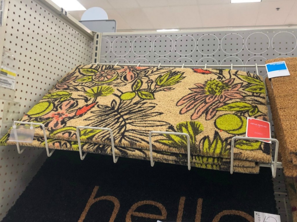 tropical outdoor mat on shelf at Target