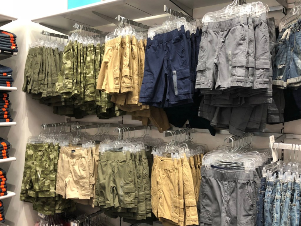 The Children's Place Baby Boys and Toddler Shorts hanging on racks