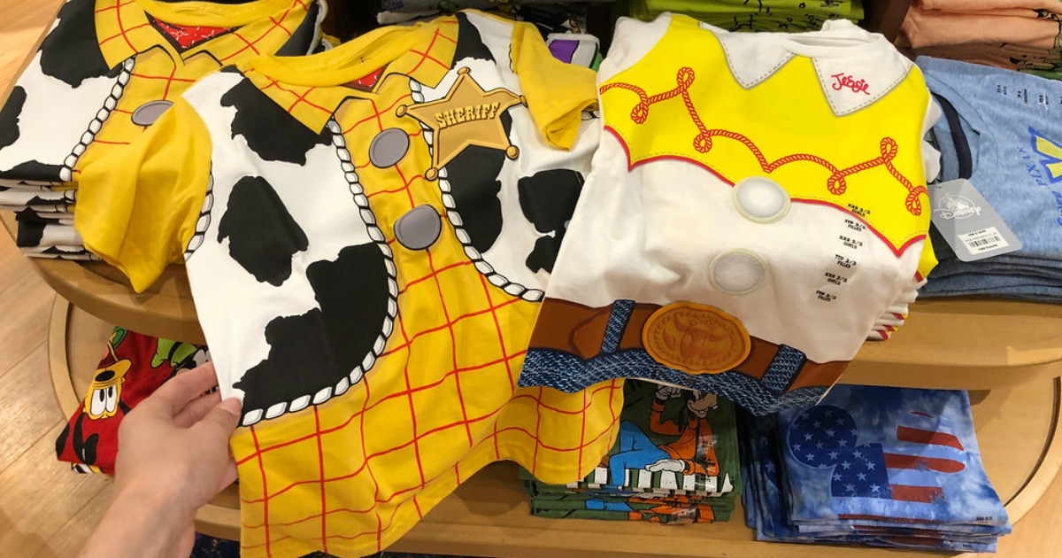 shopDisney Toy Story 4 tees being held by a woman's hand