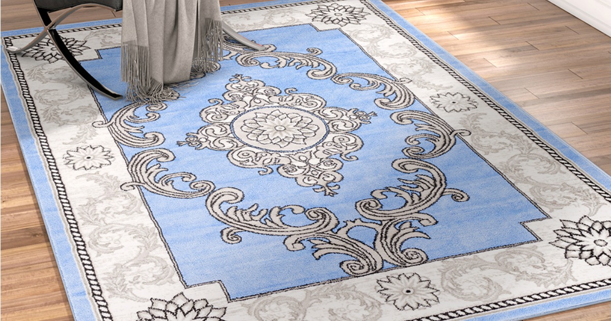 white and blue area rug with black pattern 