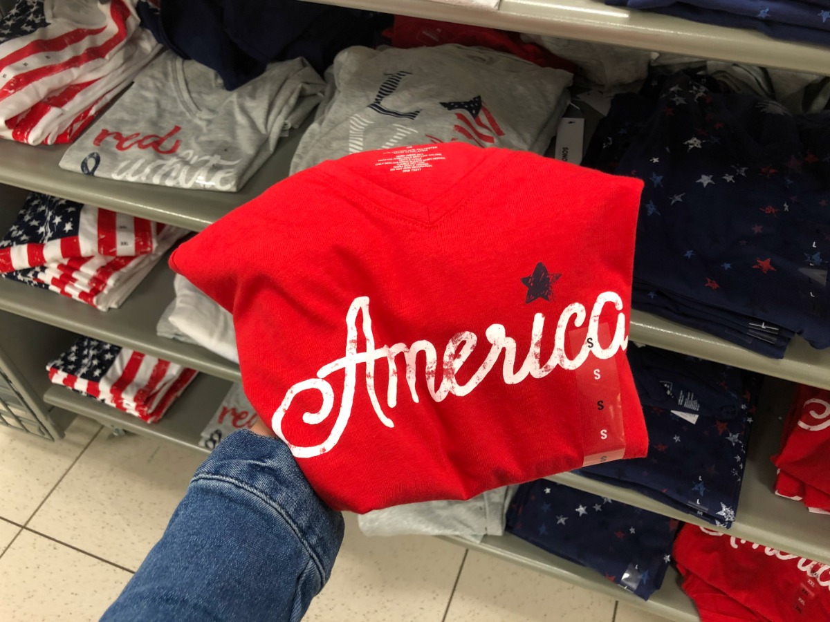 hand holding red american graphic tee at Kohl's