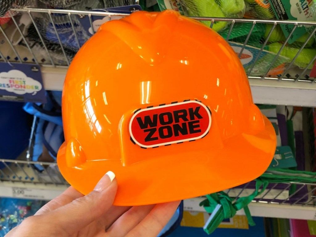 orange plastic play hat for kids in store