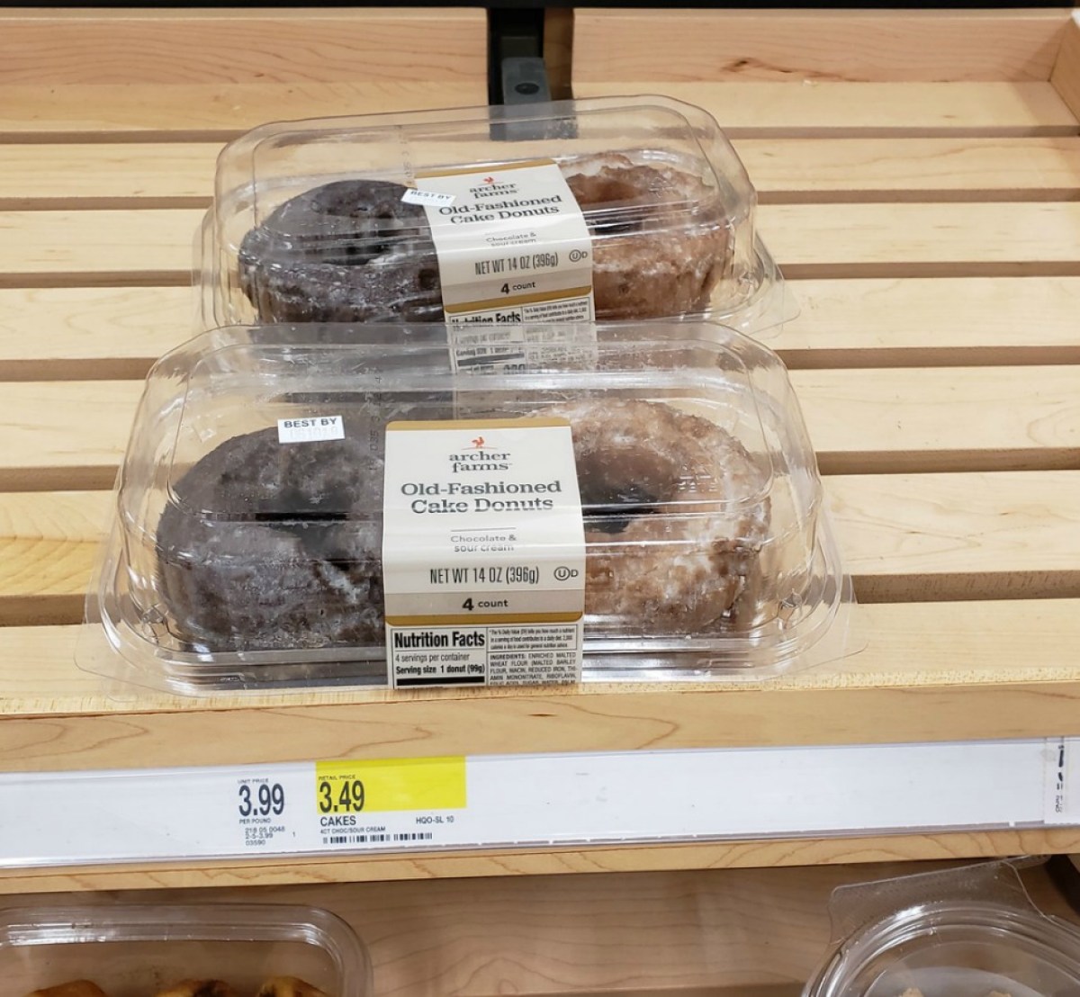 old-fashioned cake donuts sitting on display shelf