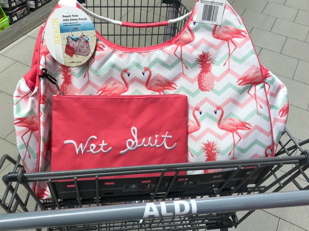 ALDI grocery cart with beach bag with flamingo print