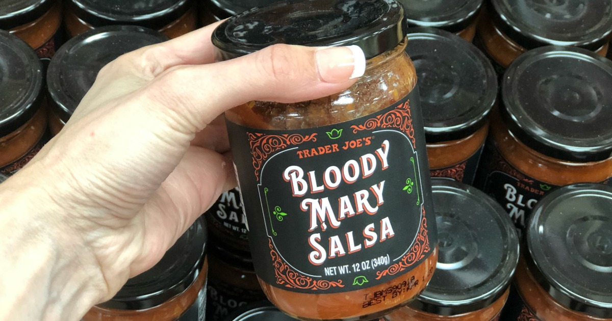 hand holding jar of bloody mary salsa