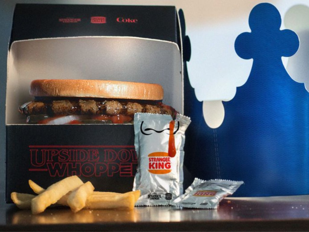 upside down whopper in box, with fries and stranger king ketchup, with blue crown