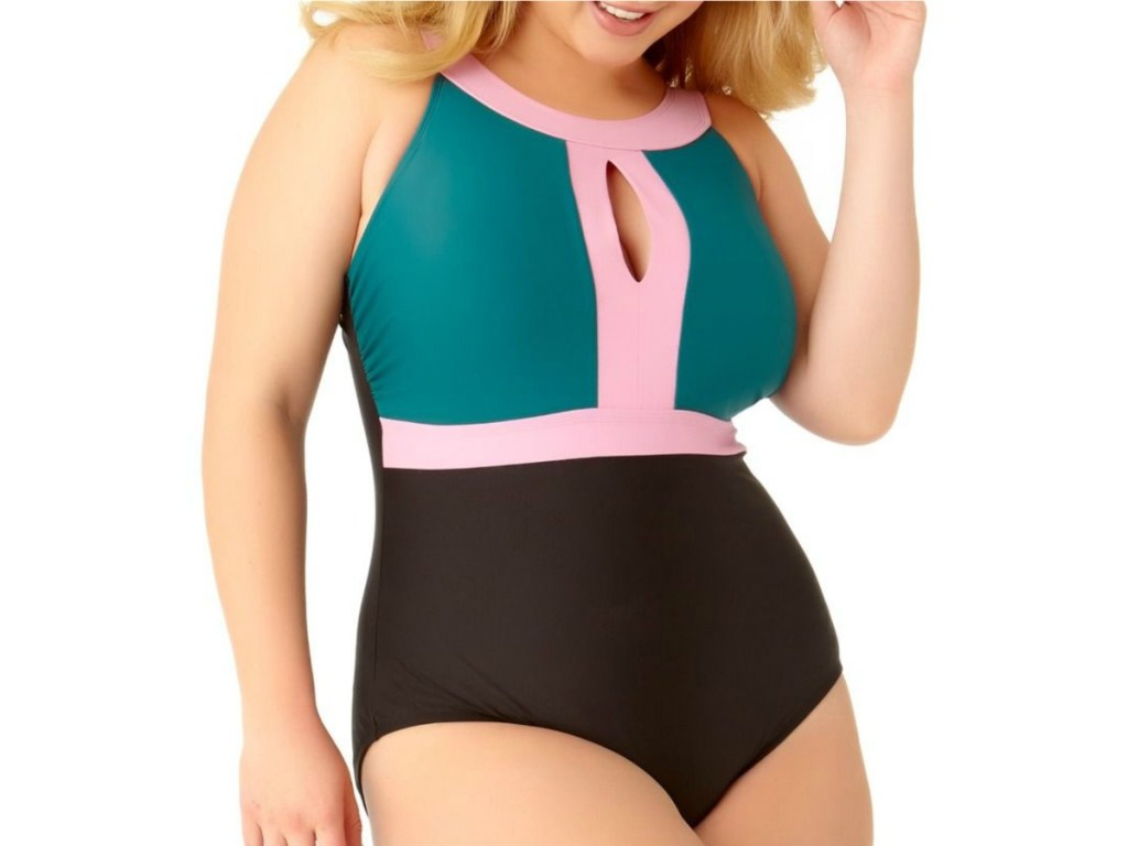 woman modelin teal, black, and pink keyhole swimsuit