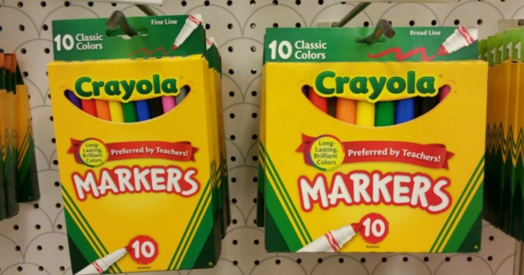 Crayola markers on hooks at a store