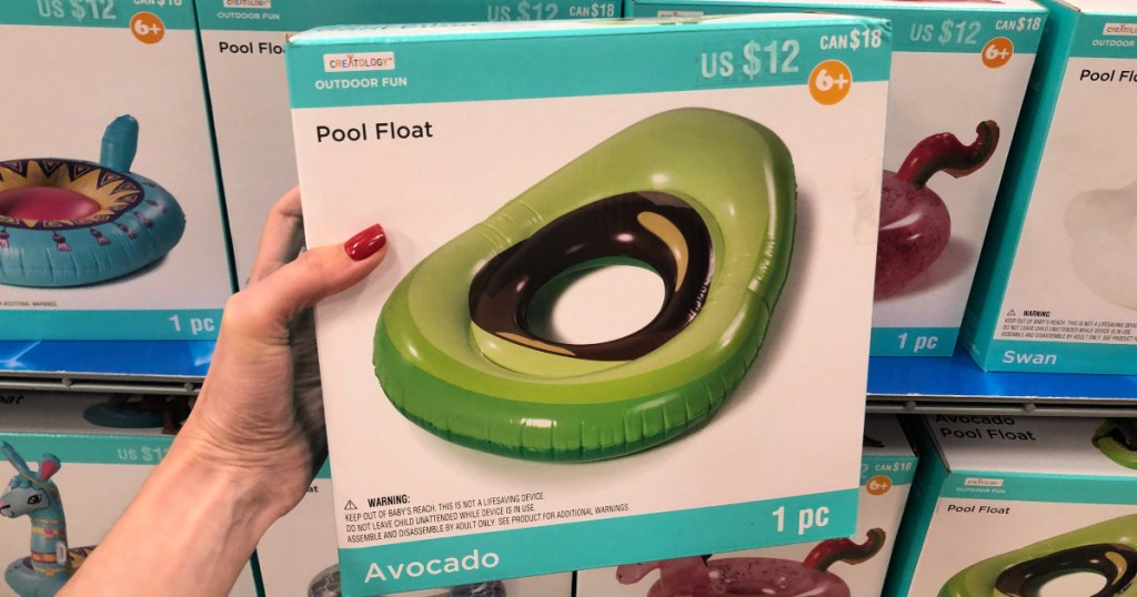 woman hand holding creatology avocado pool float in michaels