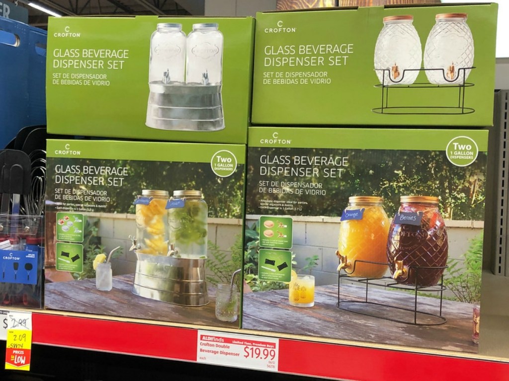boxes on store shelf with a set of glass beverage dispensers