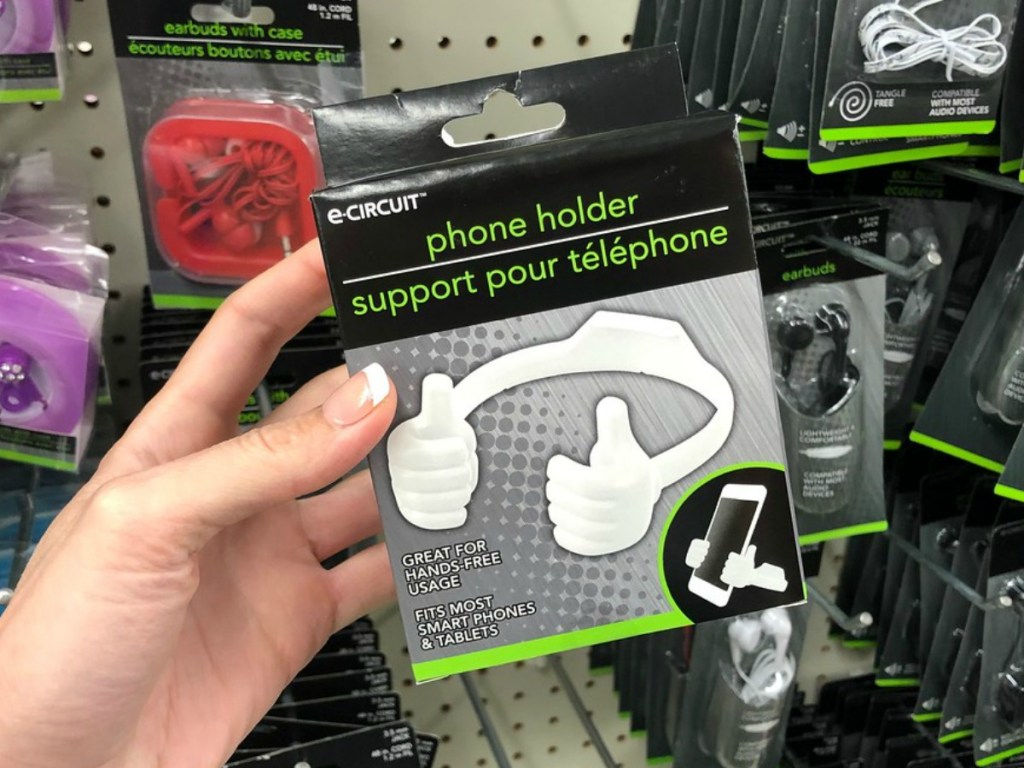 hand holding boxed package with hands free device in store