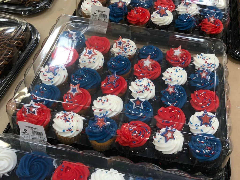 big package of cupcakes decorated in red, white and blue