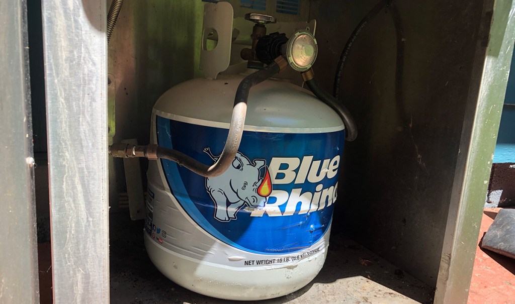 propane tank hooked up to grill