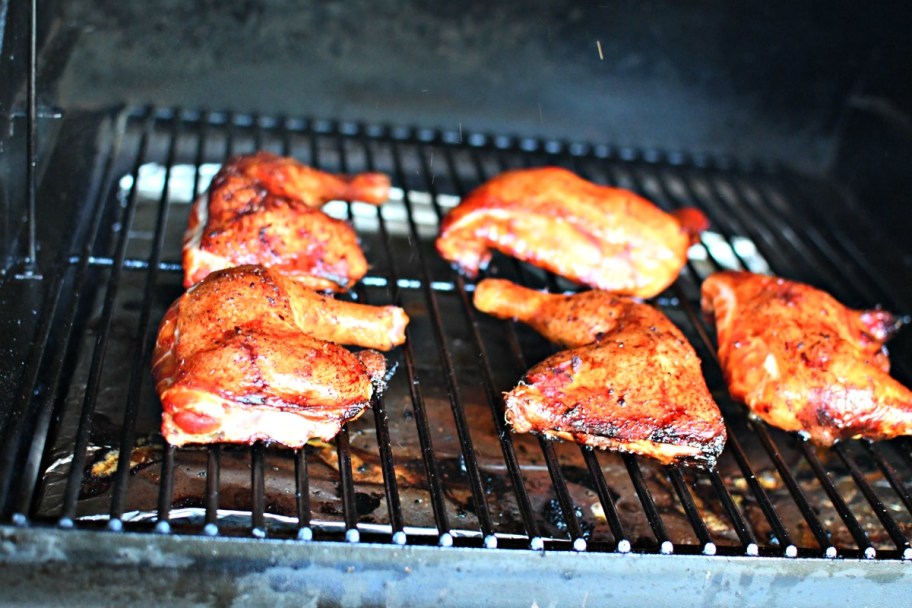grilled chicken quarters on a traeger grill