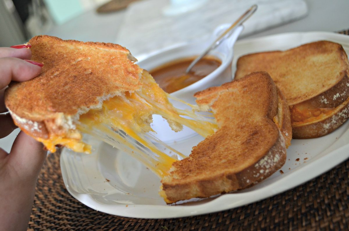 pulling apart cheesy grilled cheese sandwich 