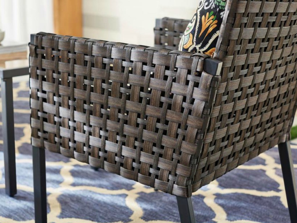wicker chair with steel frame on carpet