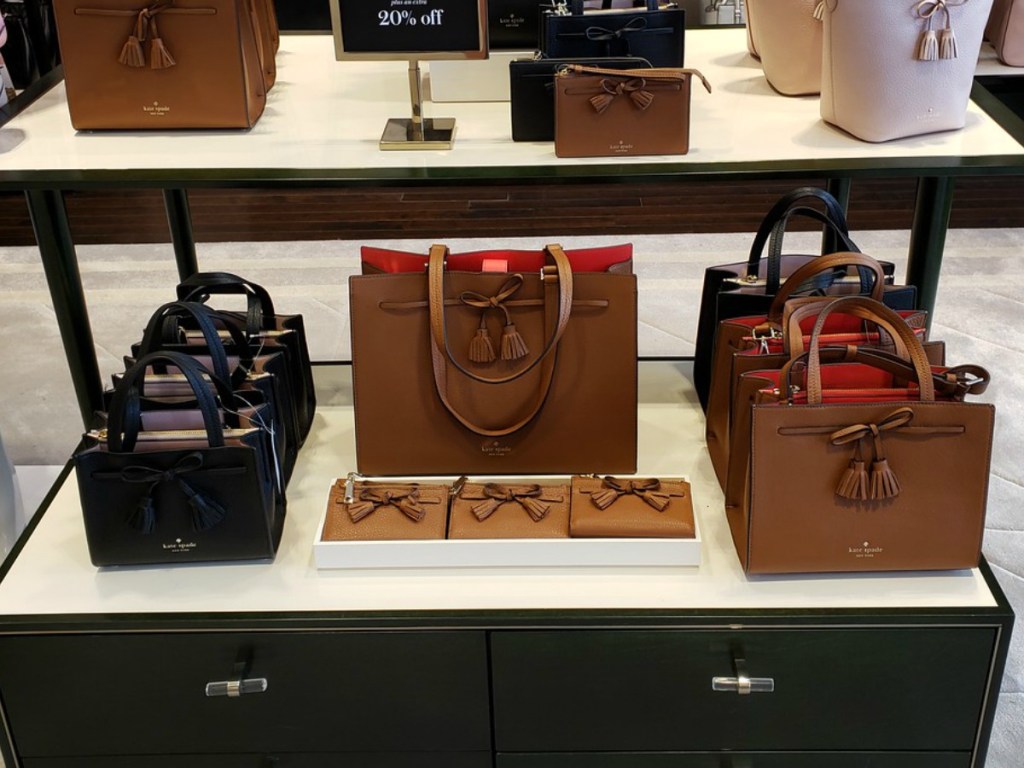 kate spade handbags on display in store