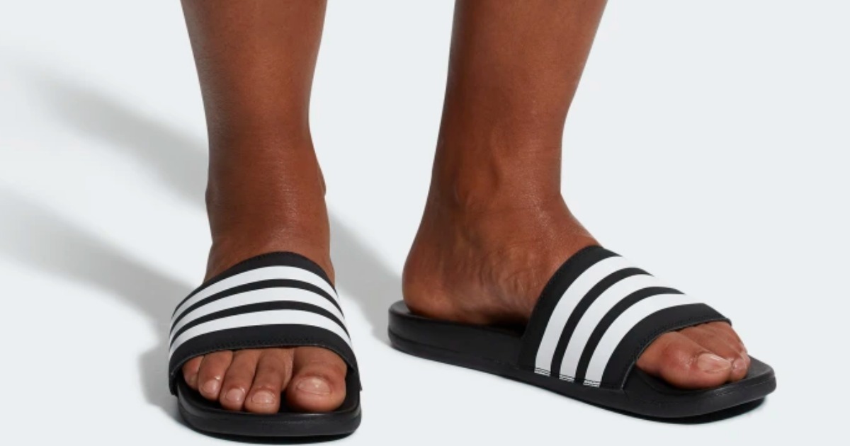 adidas slides on feet