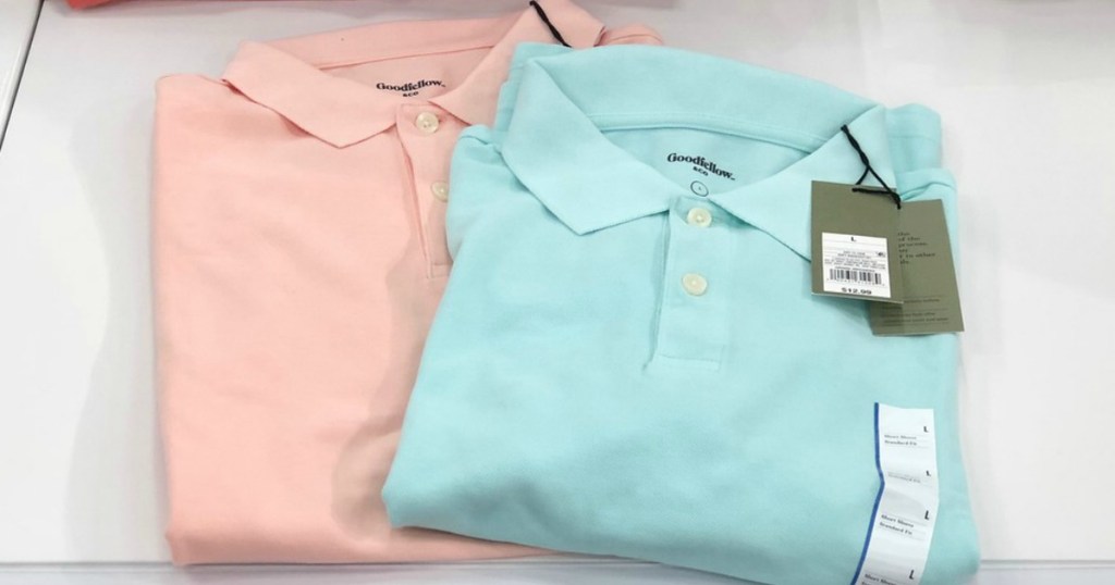 Men's pastel colored polo shirts on a table