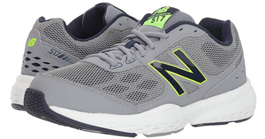 pair of gray new blance shoes with black and green N on side