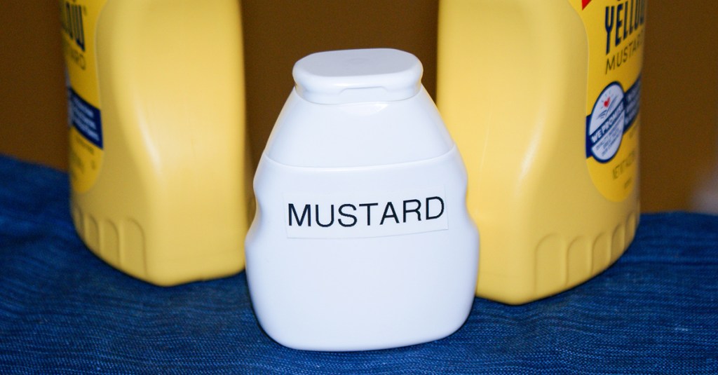 condiment container with mustard label