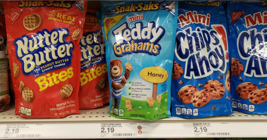 bags of mini nutter butters, teddy grahams and chips ahoy on a store shelf
