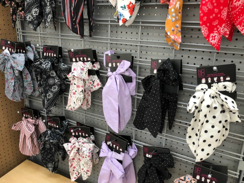 assorted colorful hair ties hanging on rack at walmart