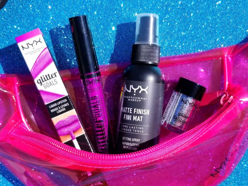 NYX Cosmetics pink make up back with matte finish spray, silver glitter, pink liquid lipstick