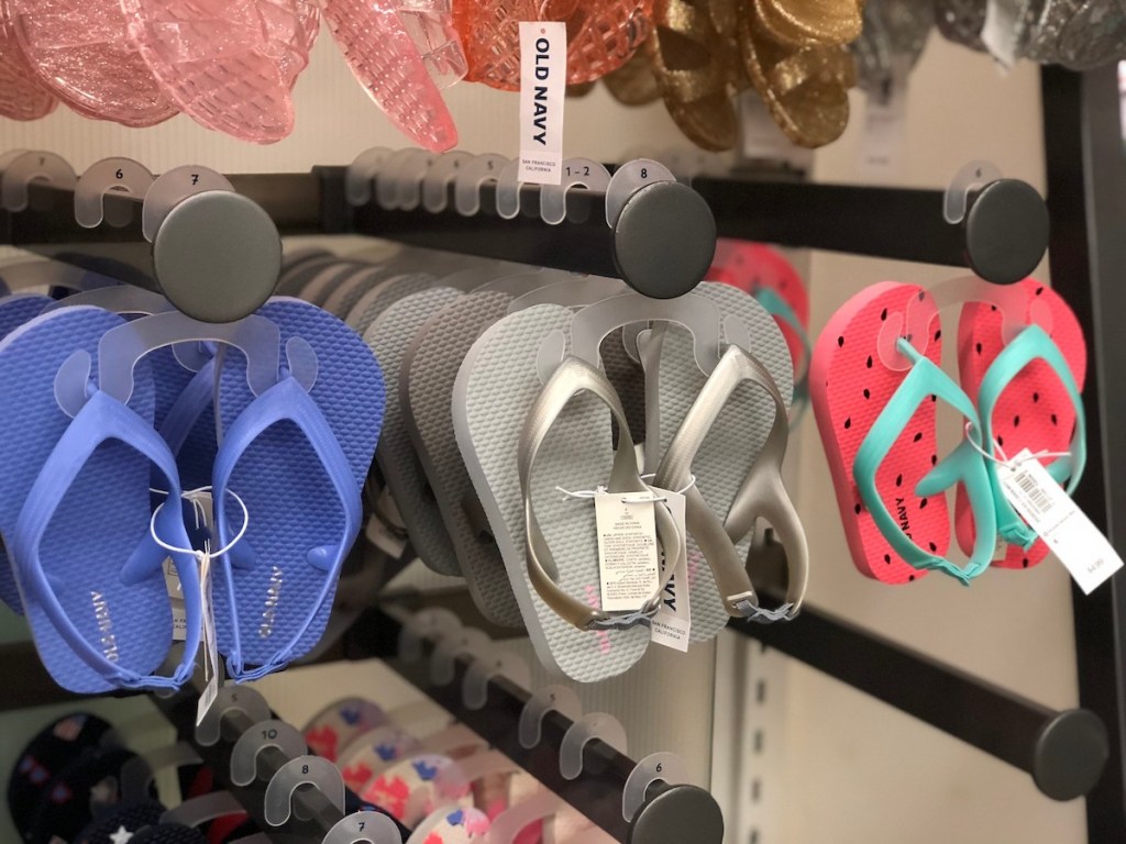 girls flip flops in blue, silver, and watermellon in store at old navy