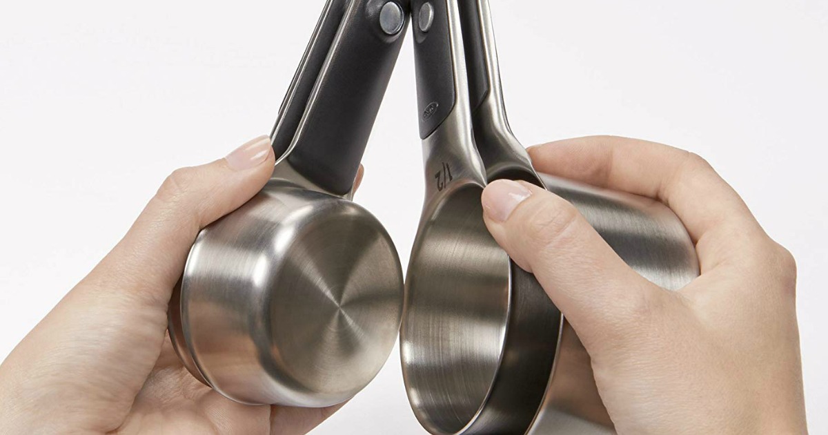 OXO Good Grips magnetic measuring cups being held