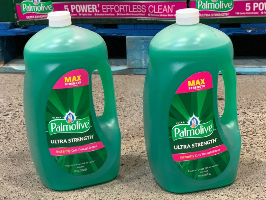 two large bottles of dishsoap on floor in store
