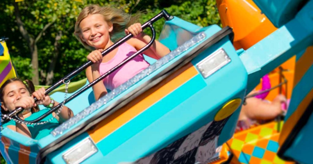 kids riding a ride at sesame place