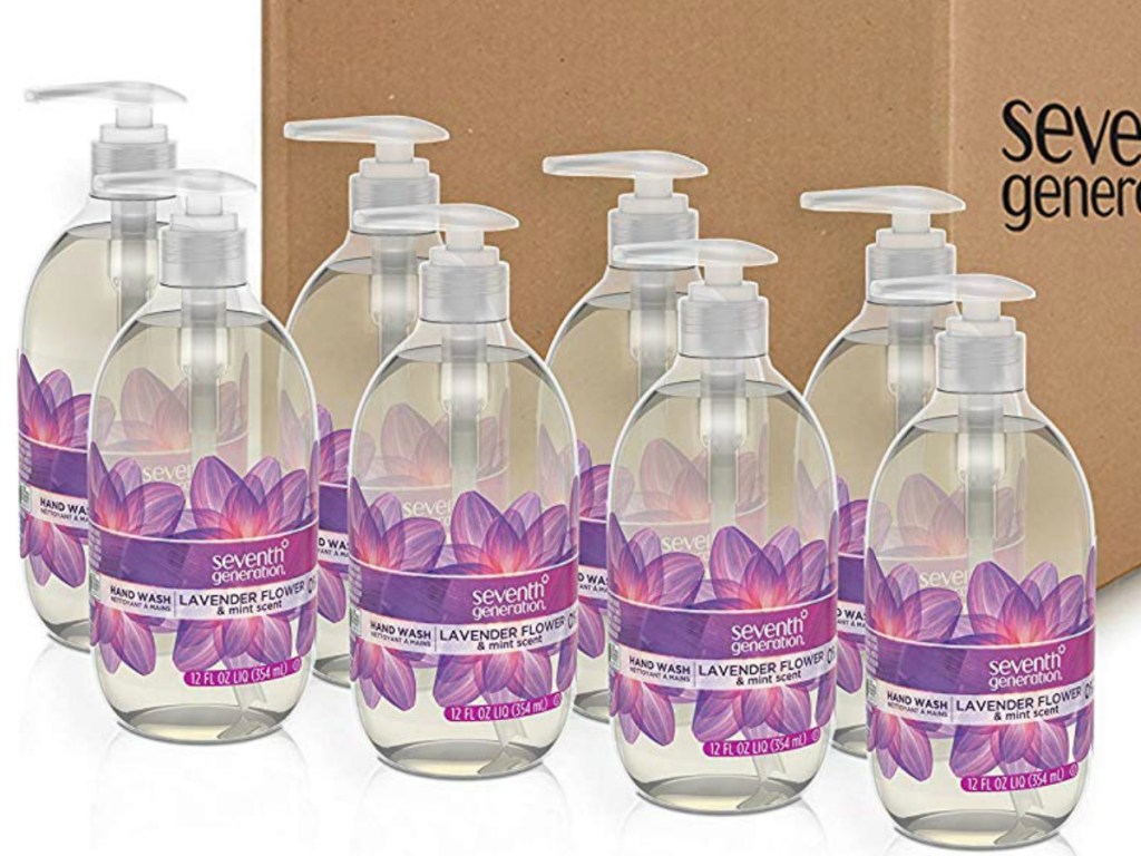 eight bottles of hand pump soap in front of a box