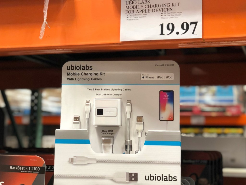 apple charging cords in store display by price sign