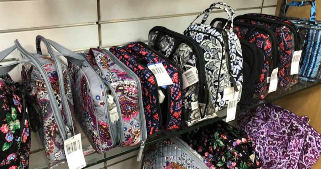 vera bradley travel bags displayed on store shelf