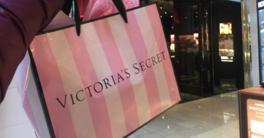 victoria's secret bag in front of storefront