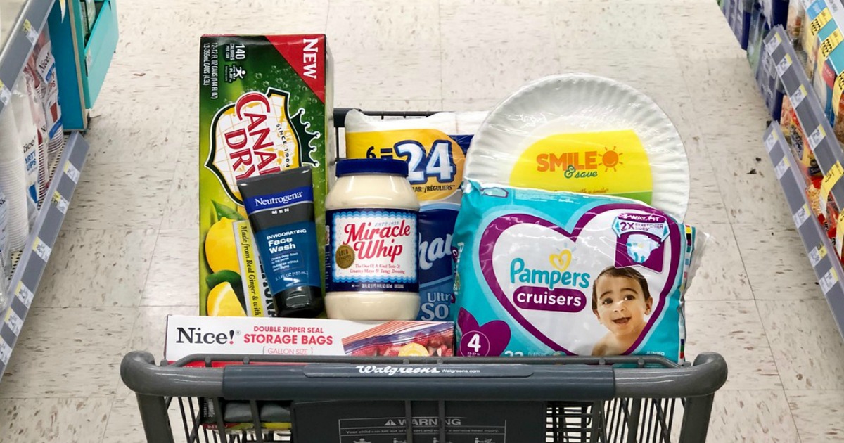 canada dry ginger ale and lemonade 12-packs, kraft miracle whip, and pampers cruisers in cart at walgreens
