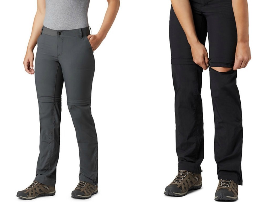 women's legs in grey pants and women's leg in black pants