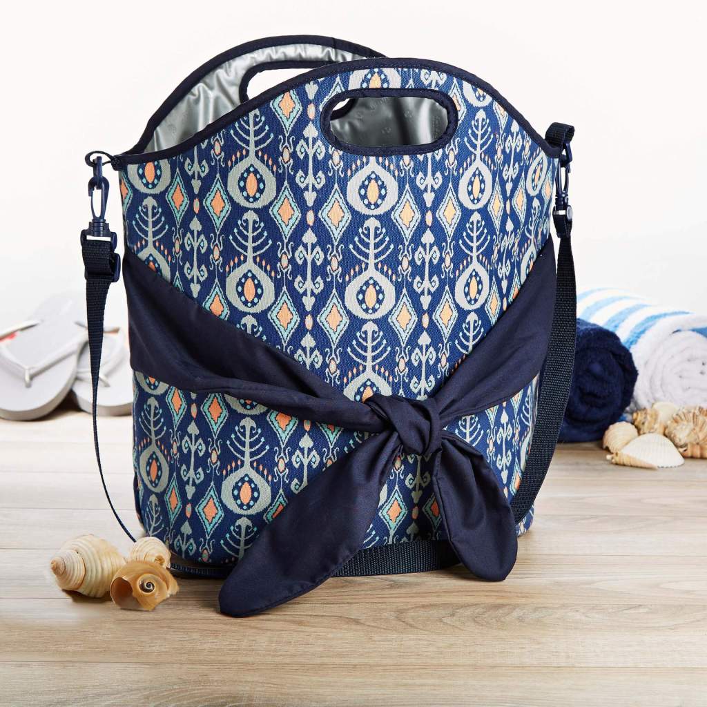 Navy patterned insulated tote on wood floor