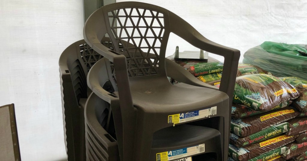 stack of brown patio chairs