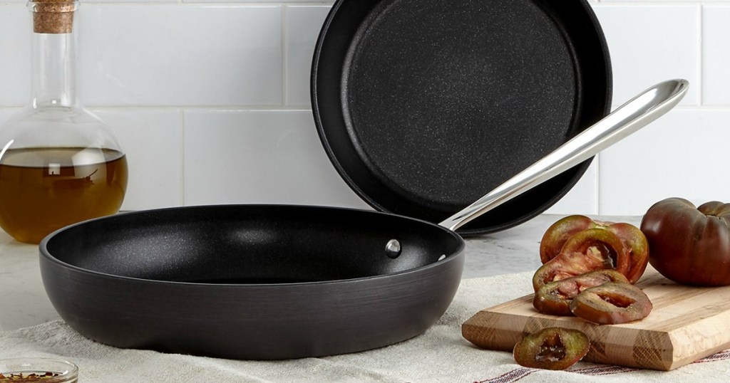 All-Clad Hard Anodized 8" and 10" Fry Pan Set in a kitchen with cooking items