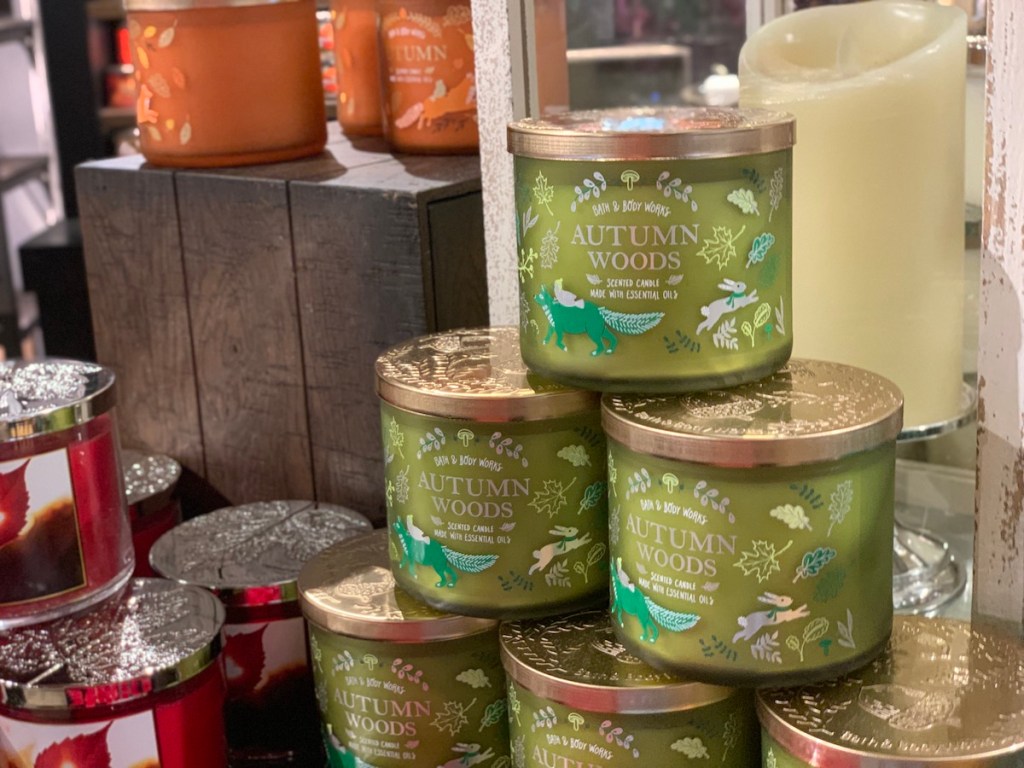 Store Display of Bath & Body Works 3-Wick Candles in Autumn Woods