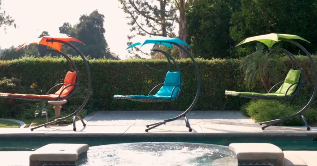 Hanging loungers by pool