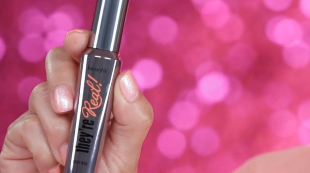 hand holding Benefit's They're Real Mascara