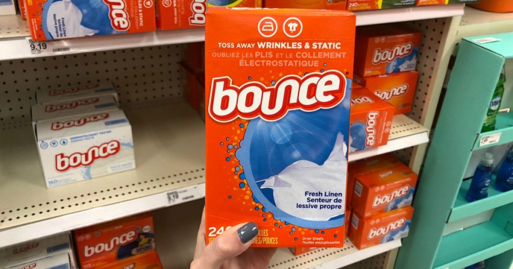 Bounce Fresh Linen Dryer Sheets being held by a woman's hand