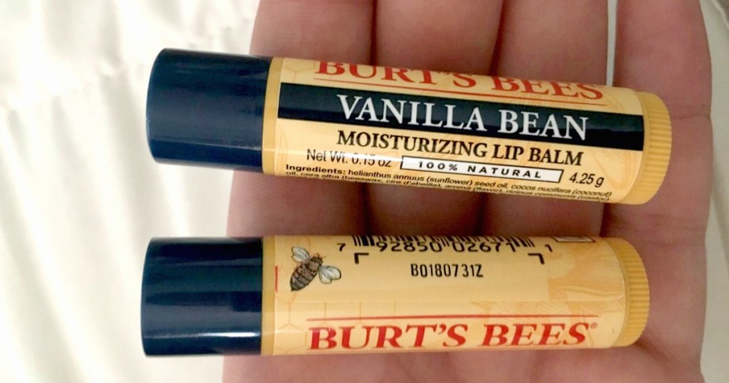 Burt's Bees Vanilla Bean Moisturizing Lip Balm being held by a person