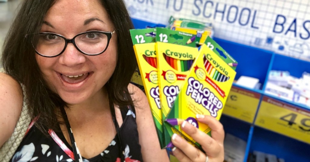 Woman holding Crayola Colored Pencils in Kroger store