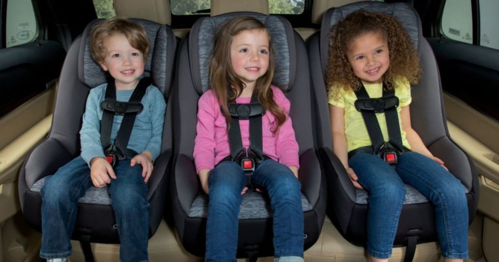 3 kids sitting in Cosco MightyFit 65 Convertible Car Seat